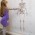 Child looking at skeleton poster